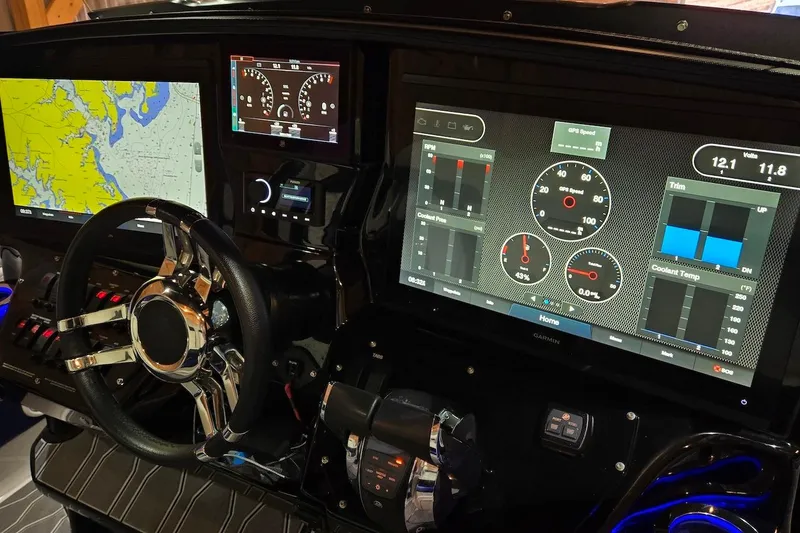 Slide: The Image of 2021 Sunsation 34 CCX dashboard with navigation and performance displays. - 21
