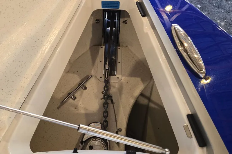 Slide: The Image of 2021 Sunsation 34 CCX anchor compartment with chain and cleat details. - 33