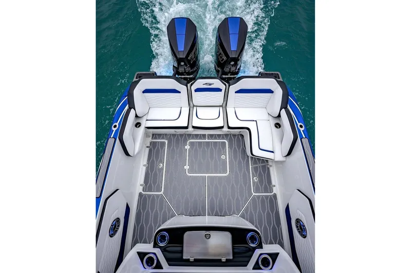 Slide: The Image of 2021 Sunsation 34 CCX boat deck with dual engines and stylish seating. - 5