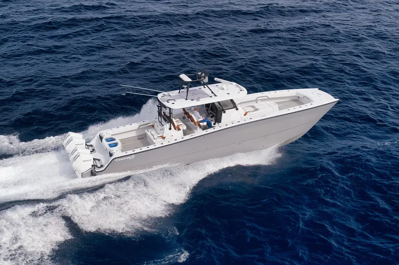 Slide: The Image of Freeman 42LR 2022 boat cruising on open ocean waters. - 11