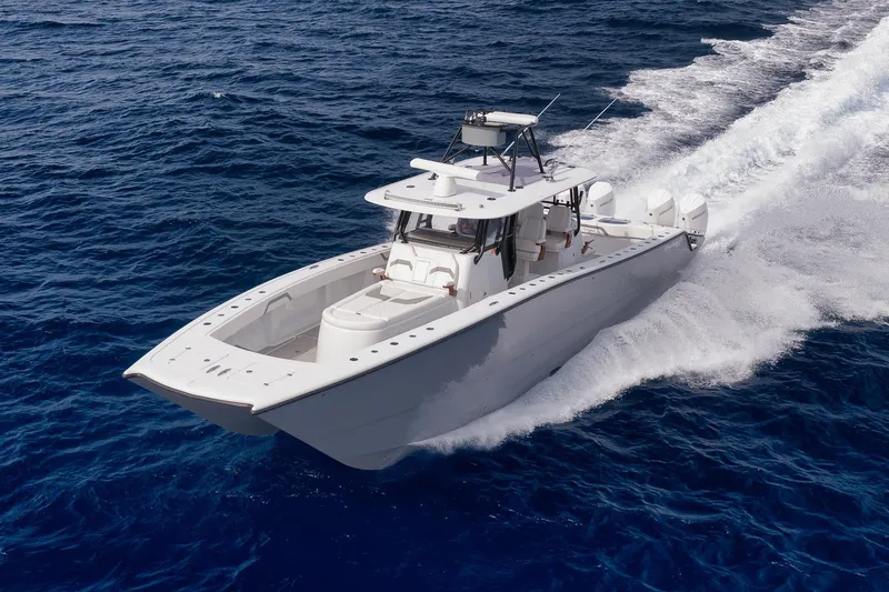 Slide: The Image of 2022 Freeman 42LR boat cruising on open ocean waters. - 21