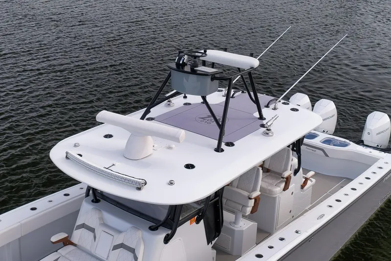 Slide: The Image of 2022 Freeman 42LR boat with advanced radar system on calm water. - 27