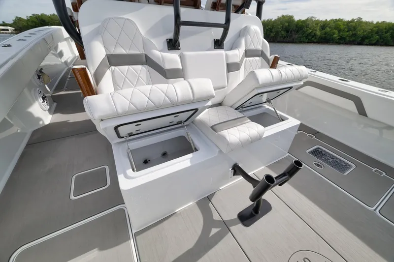 Slide: The Image of Luxurious seating and storage on 2022 Freeman 42LR boat, featuring sleek design and functionality. - 41