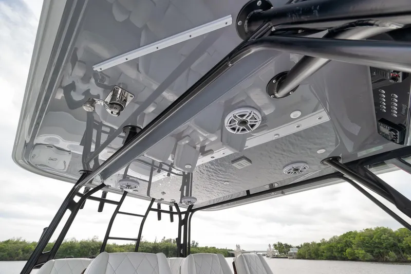 Slide: The Image of 2022 Freeman 42LR boat interior with speakers and sleek design. - 53