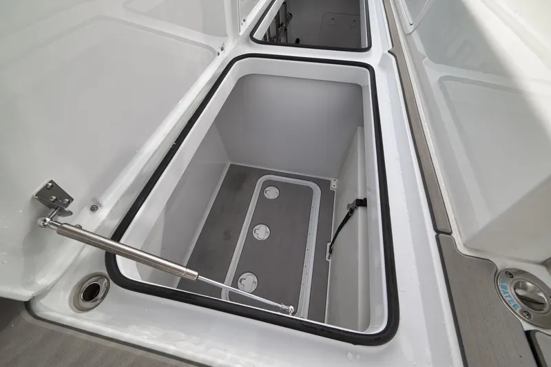 Slide: The Image of Spacious storage compartment in 2022 Freeman 42LR boat, featuring durable construction and secure latches. - 64