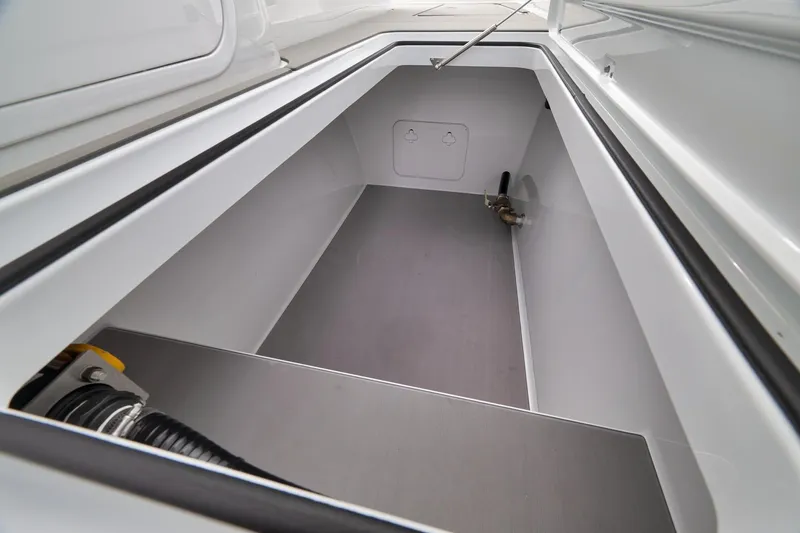 Slide: The Image of Open storage compartment in 2022 Freeman 42LR boat, showcasing clean interior design. - 67