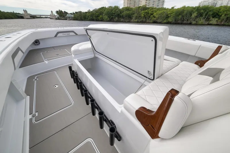 Slide: The Image of Luxurious 2022 Freeman 42LR boat interior with open storage and elegant seating. - 72