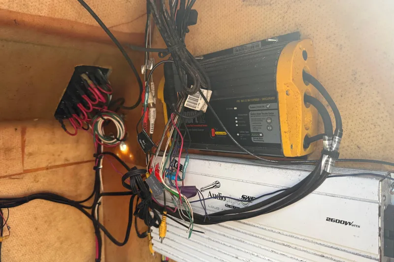Slide: The Image of Electrical wiring and components inside a 1998 Novamarine SEVEN HD boat. - 19
