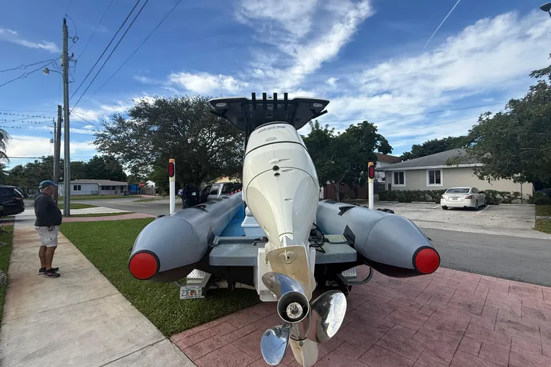 Slide: The Image of 1998 Novamarine SEVEN HD boat on trailer in suburban neighborhood. - 5