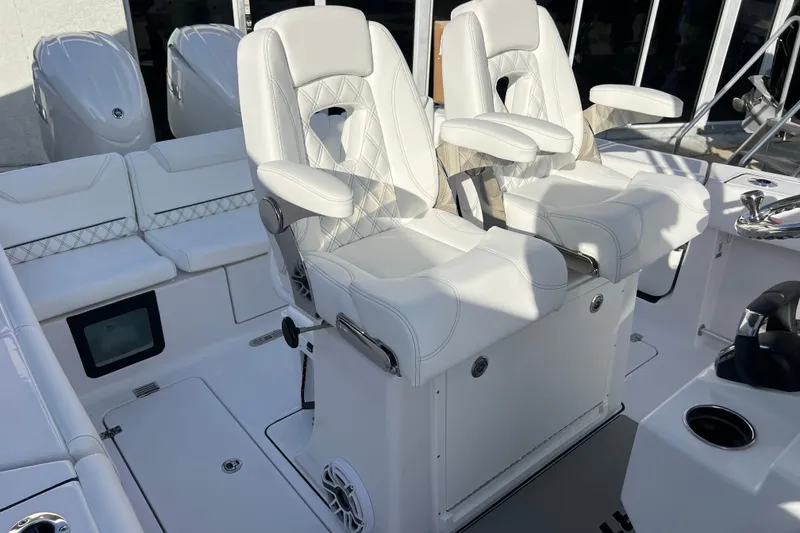 Slide: The Image of 2026 Sportsman Heritage 261 Center Console with luxurious white seating and modern design. - 21