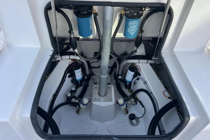 Slide: The Image of 2026 Sportsman Heritage 261 Center Console boat wiring and plumbing system. - 24