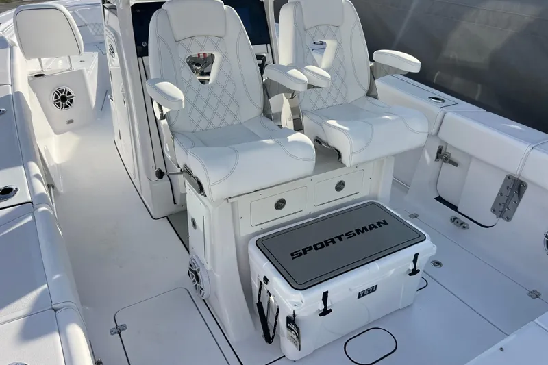 Slide: The Image of 2026 Sportsman Heritage 261 Center Console with white seating and storage. - 9