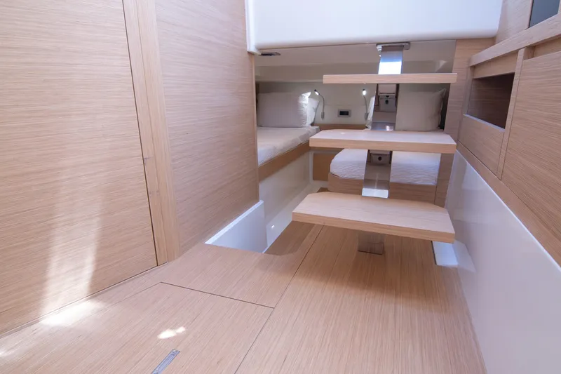 Slide: The Image of Luxurious interior of 2024 Pardo Yachts 38, featuring modern wood finishes and elegant design. - 24