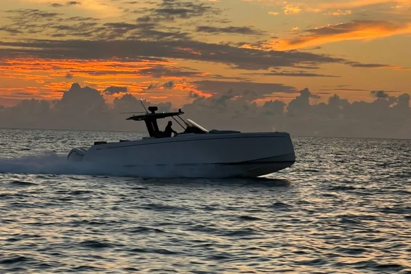Slide: The Image of 2024 Pardo Yachts 38 cruising at sunset on the ocean. - 32