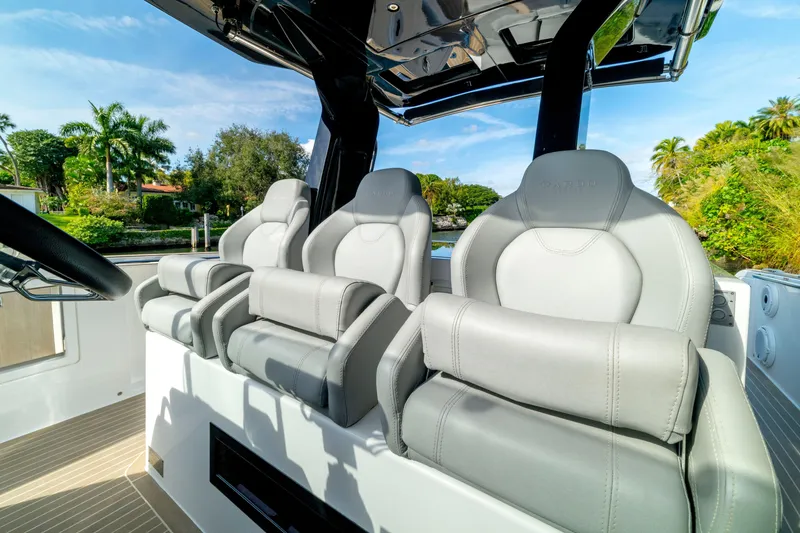 Slide: The Image of 2024 Pardo Yachts 38, sleek deck design with integrated speaker, under clear blue sky. - 15