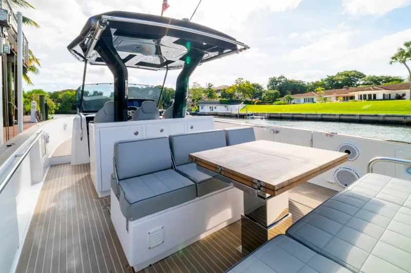 Slide: The Image of Luxury seating area on 2024 Pardo Yachts 38, featuring elegant design and waterfront view. - 19