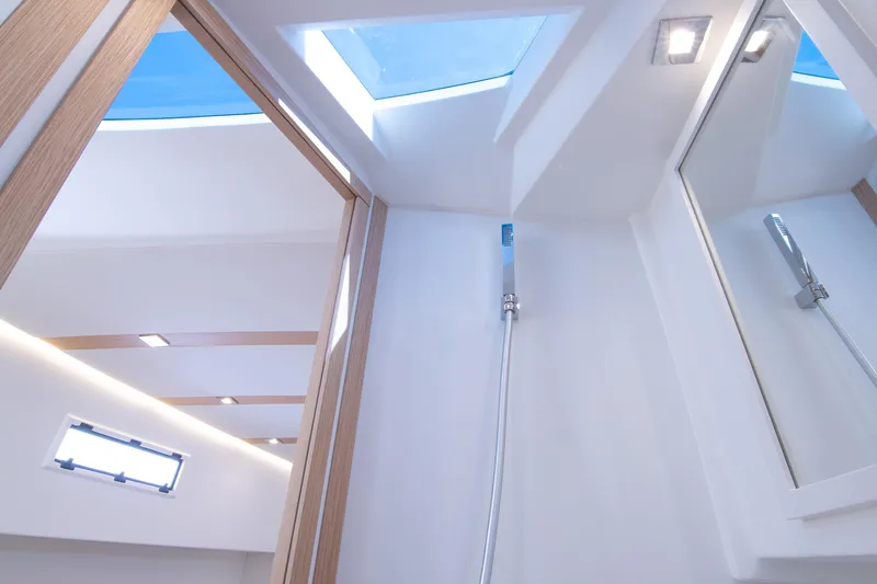 Slide: The Image of Modern bathroom interior of 2024 Pardo Yachts 38, featuring sleek sink and toilet design. - 28