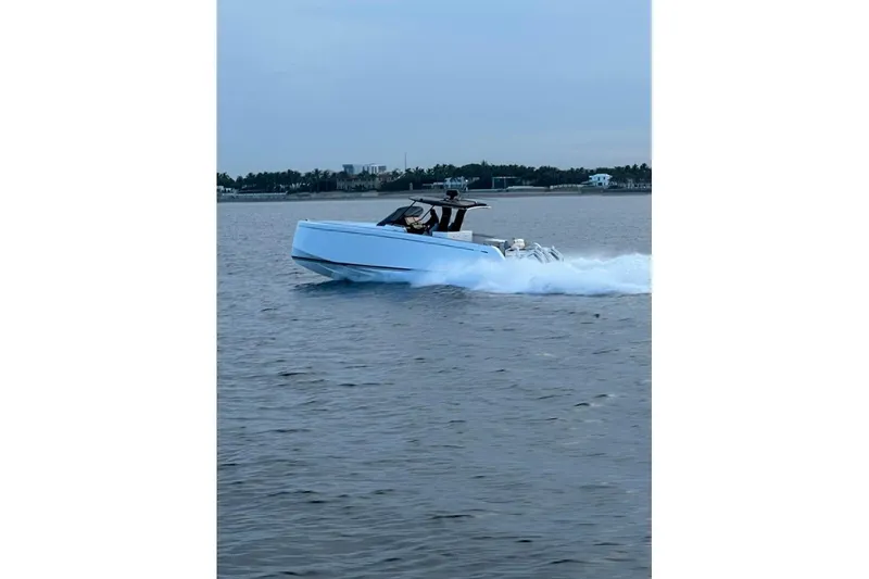 Slide: The Image of 2024 Pardo Yachts 38 cruising on open water, showcasing sleek design and performance. - 37