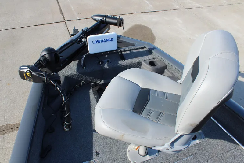Slide: The Image of 2018 Tracker Pro Team 175 TF boat with Lowrance fish finder and comfortable seating. - 12