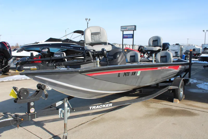 Slide: The Image of 2018 Tracker Pro Team 175 TF fishing boat on trailer, displayed outdoors. - 3