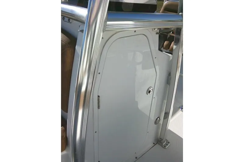 Slide: The Image of 2023 Sea Hunt Ultra 234 boat console with sleek metallic finish. - 20