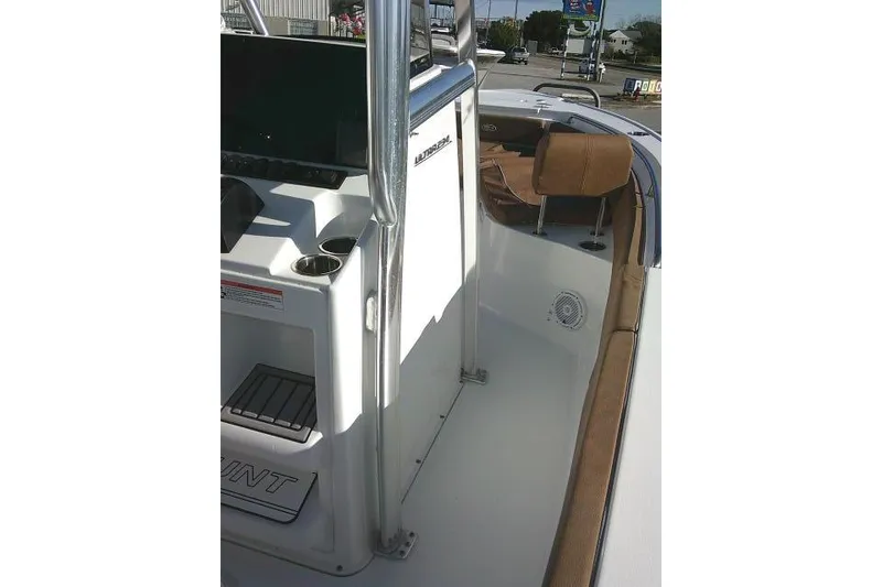 Slide: The Image of 2023 Sea Hunt Ultra 234 boat interior with seating and console details. - 24