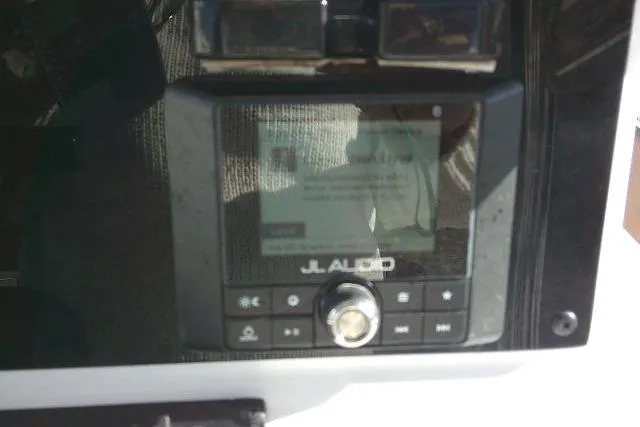 Slide: The Image of JL Audio system on 2023 Sea Hunt Ultra 234 boat dashboard. - 36