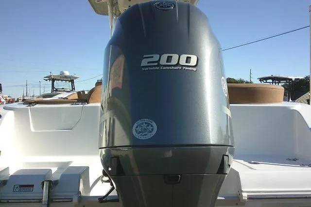Slide: The Image of 2023 Sea Hunt Ultra 234 boat with 200 horsepower engine, rear view. - 41