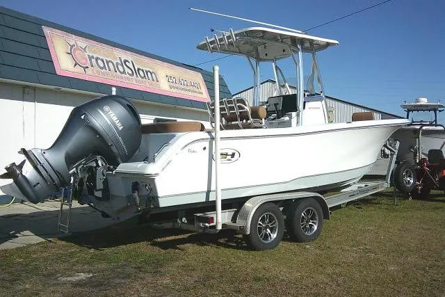 Slide: The Image of 2023 Sea Hunt Ultra 234 boat on trailer with Yamaha outboard motor. - 7