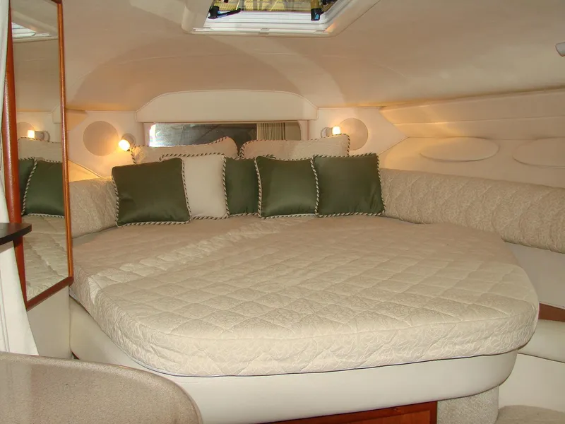 Slide: The Image of Interior of 2001 Sea Ray 340 Sundancer with cozy bed. - 13