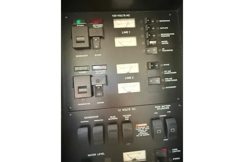 Slide: The Image of Electrical control panel on a 2001 Sea Ray 340 Sundancer boat. - 27