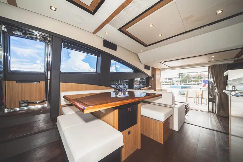 Slide: The Image of Luxurious interior of 2017 Sea Ray L650 Fly yacht with elegant dining area and scenic views. - 20