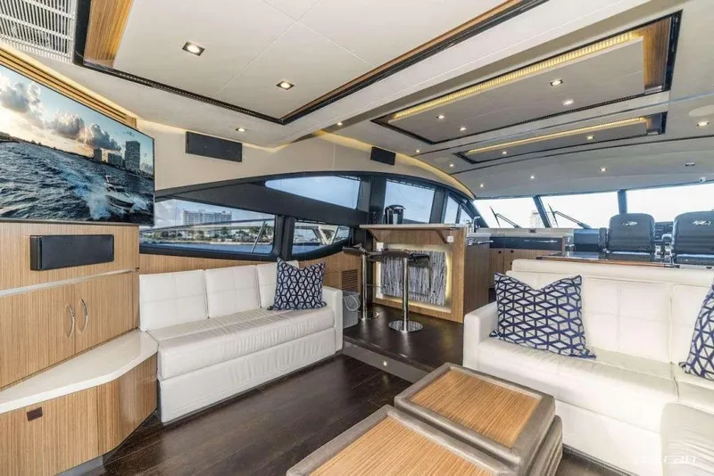 Slide: The Image of Luxurious interior of 2017 Sea Ray L650 Fly yacht with modern seating and entertainment system. - 3