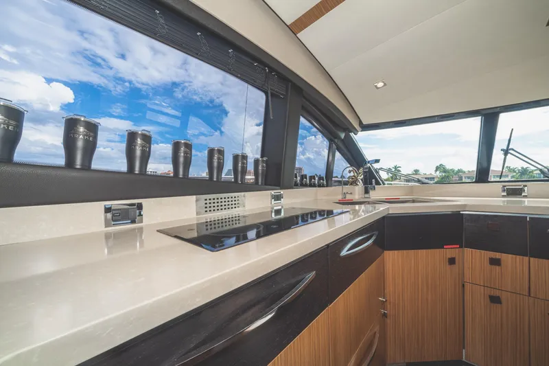 Slide: The Image of Luxurious 2017 Sea Ray L650 Fly yacht kitchen with modern design and scenic window view. - 30