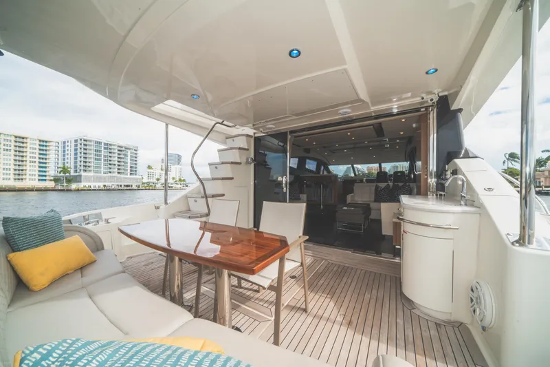 Slide: The Image of Luxurious 2017 Sea Ray L650 Fly yacht with elegant outdoor seating and modern interior. - 37