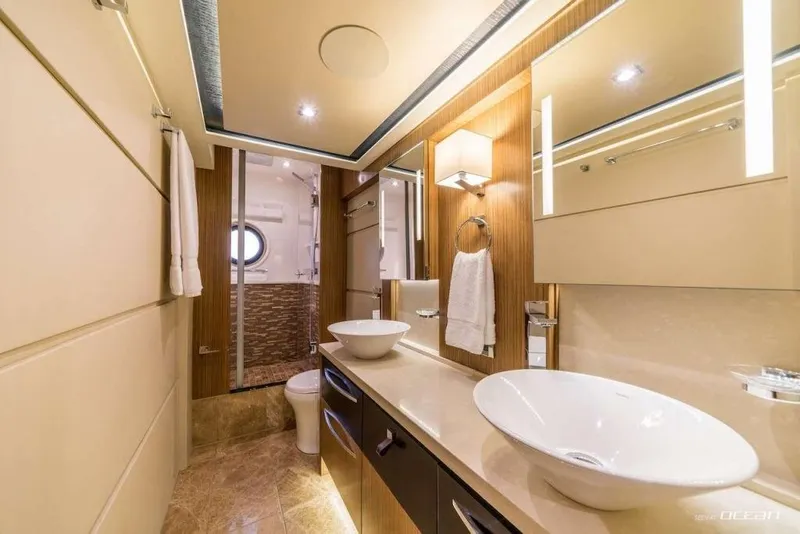 Slide: The Image of Luxurious bathroom interior of 2017 Sea Ray L650 Fly yacht with modern fixtures. - 6