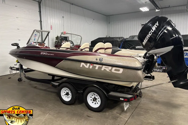 Slide: The Image of 2009 Nitro 290 Sport boat with Mercury engine in indoor showroom. - 4