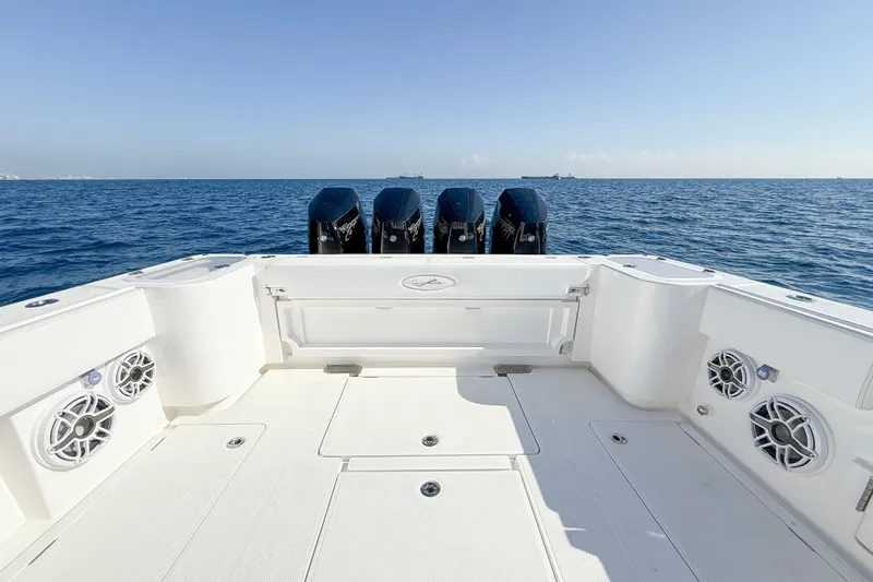 Slide: The Image of 2026 Blackwater 41 Sportfish boat deck with ocean view and powerful engines. - 26