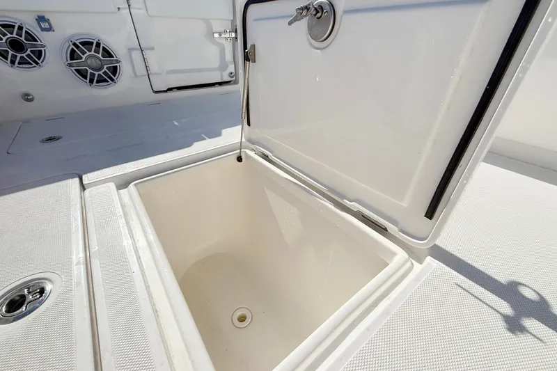 Slide: The Image of Open storage compartment on 2026 Blackwater 41 Sportfish boat deck. - 28