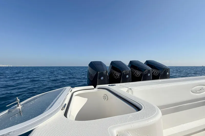 Slide: The Image of 2026 Blackwater 41 Sportfish boat with quad engines on open sea. - 32