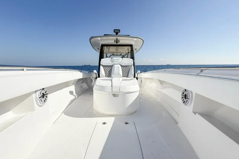 Slide: The Image of 2026 Blackwater 41 Sportfish boat on open sea, showcasing sleek design and spacious deck. - 43