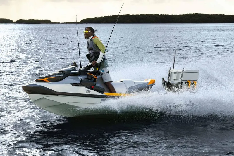Slide: The Image of Manufacturer Provided Image: 2026 Sea-Doo Fishpro Trophy 170 jet ski with fishing gear on open water. - 2
