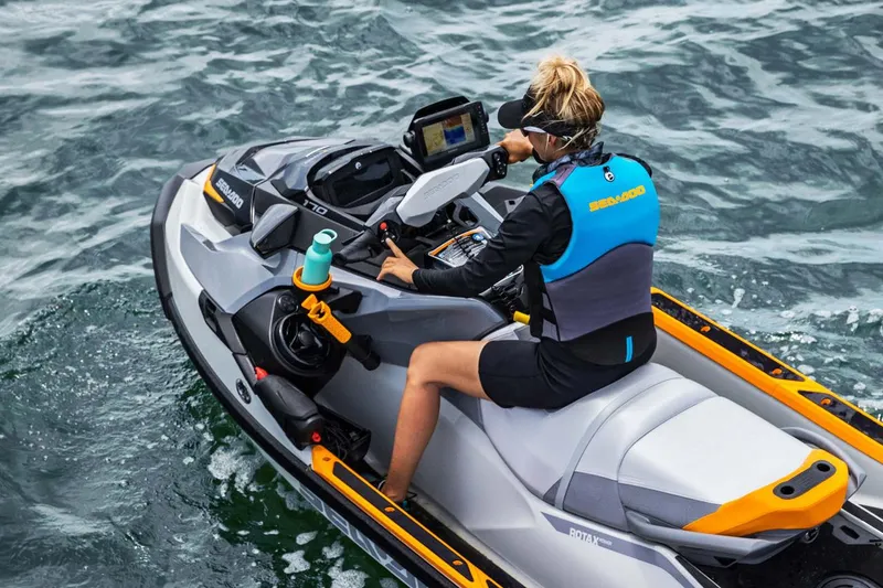 Slide: The Image of Manufacturer Provided Image: Person riding 2026 Sea-Doo Fishpro Trophy 170 on water, wearing a life vest. - 4