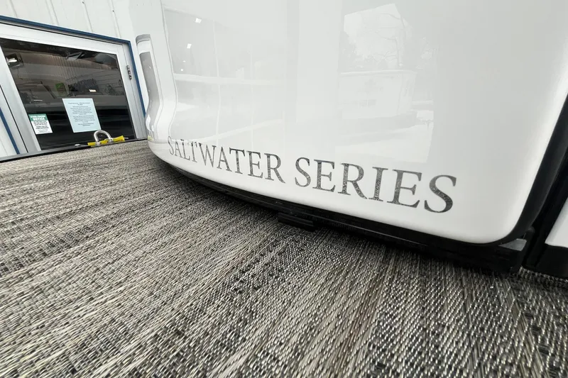 Slide: The Image of 2026 Avalon Excalibur LTD Quad Lounge, Saltwater Series, close-up view. - 11