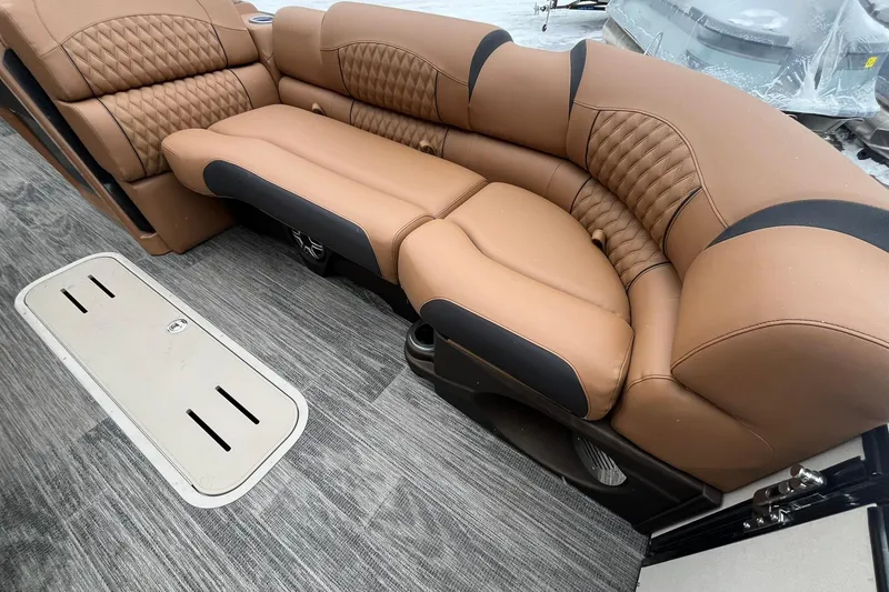 Slide: The Image of Luxurious seating in 2026 Avalon Excalibur LTD Quad Lounge boat interior. - 14