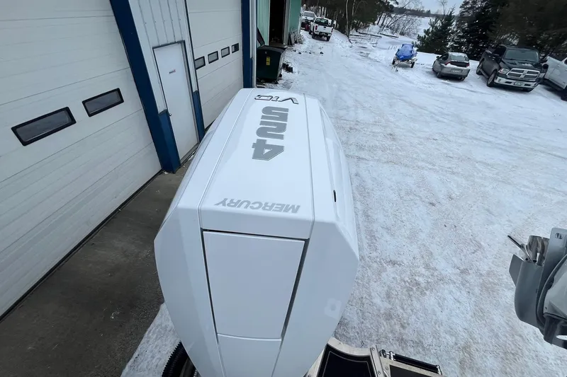 Slide: The Image of 2026 Avalon Excalibur LTD Quad Lounge with Mercury engine in snowy outdoor setting. - 21