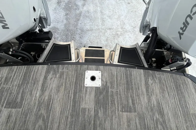 Slide: The Image of 2026 Avalon Excalibur LTD Quad Lounge boat deck with dual Mercury engines. - 23