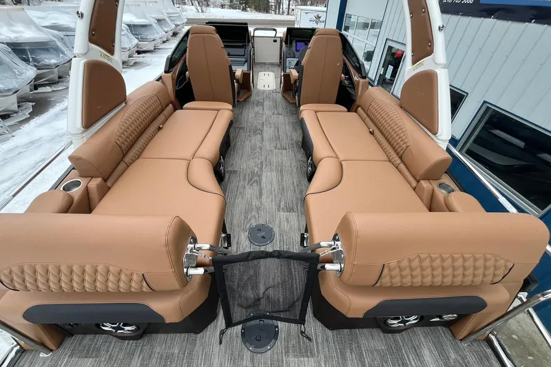 Slide: The Image of 2026 Avalon Excalibur LTD Quad Lounge interior with luxurious tan seating and modern design. - 24
