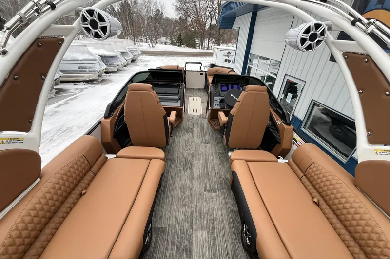 Slide: The Image of 2026 Avalon Excalibur LTD Quad Lounge interior with luxurious tan seating and modern design. - 31