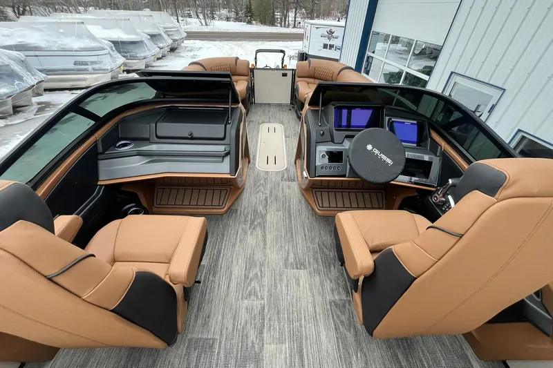 Slide: The Image of 2026 Avalon Excalibur LTD Quad Lounge interior with luxurious seating and modern dashboard. - 32